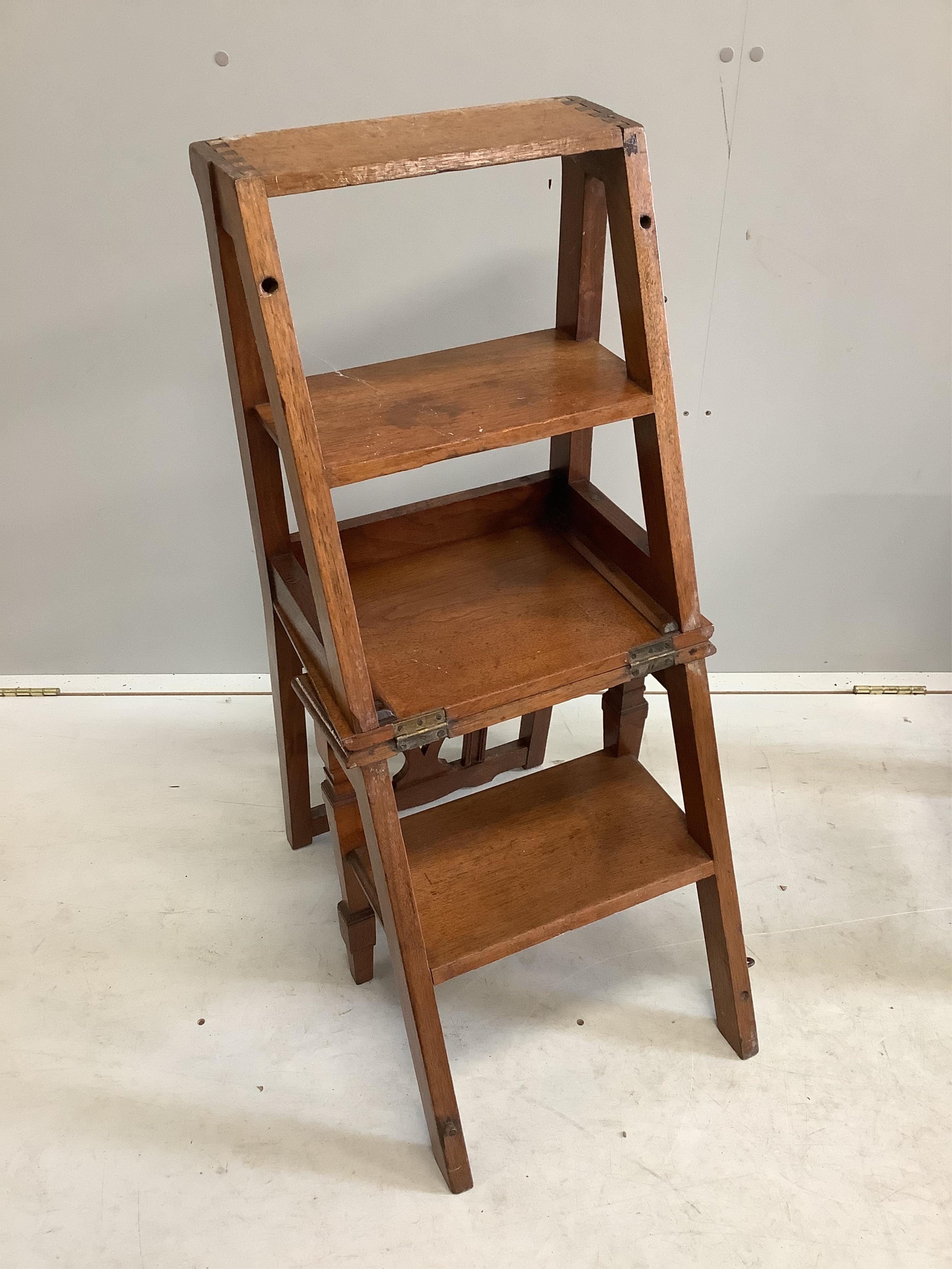 A late Victorian walnut metamorphic library chair together with a provincial fruitwood stool, Condition - fair to good